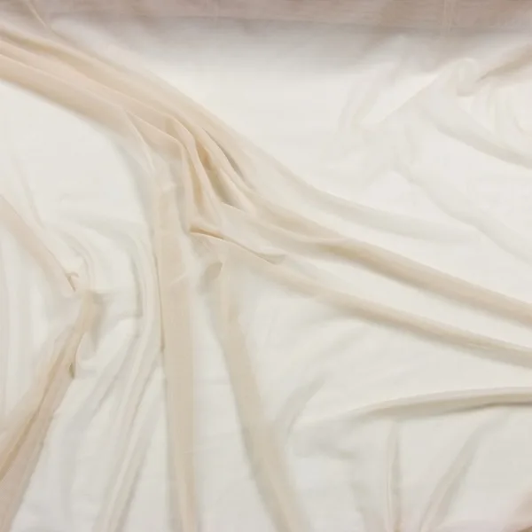 Tissu résille beige clair extensible - Élégance italienne