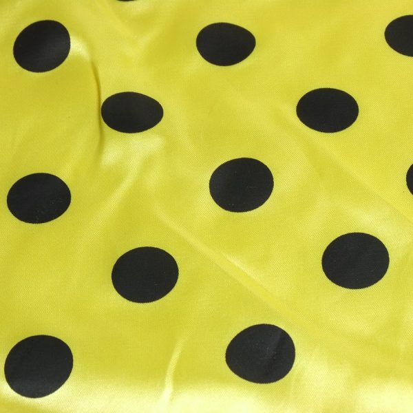 Coupon - Tissu satin jaune pois noir - Élégance et confort intemporel
