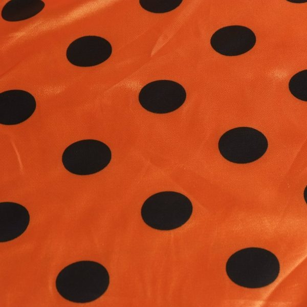Coupon - Tissu satin orange pois noir - Élégance et confort intemporel